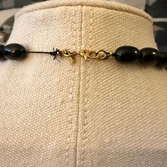 Vintage Monet Signed Black Graduated Bead Necklace with Gold Tone Spacers. - Picture 3 of 5